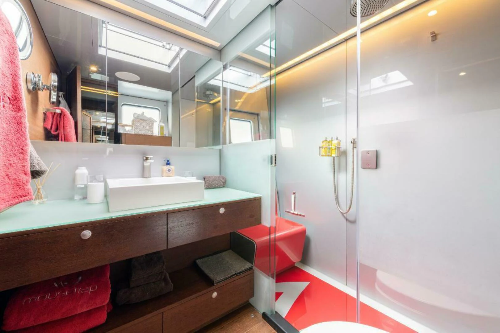 a bathroom with a sink and a shower aboard MOUSETRAP Yacht for Sale