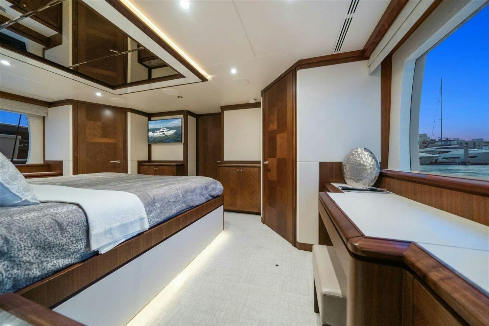 a room with beds and a window aboard CAROL ELAINE Yacht for Sale