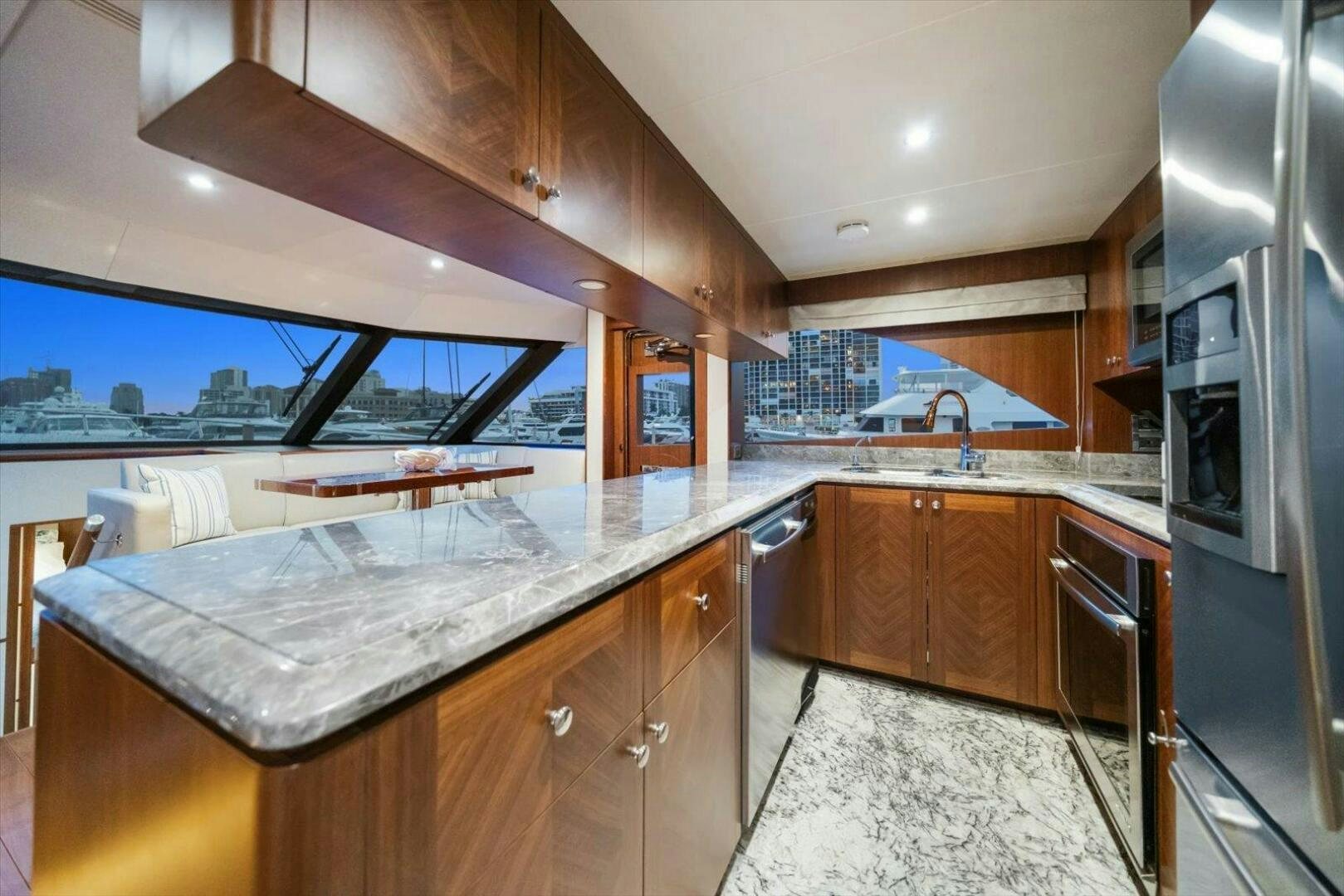 a kitchen with a large island aboard CAROL ELAINE Yacht for Sale
