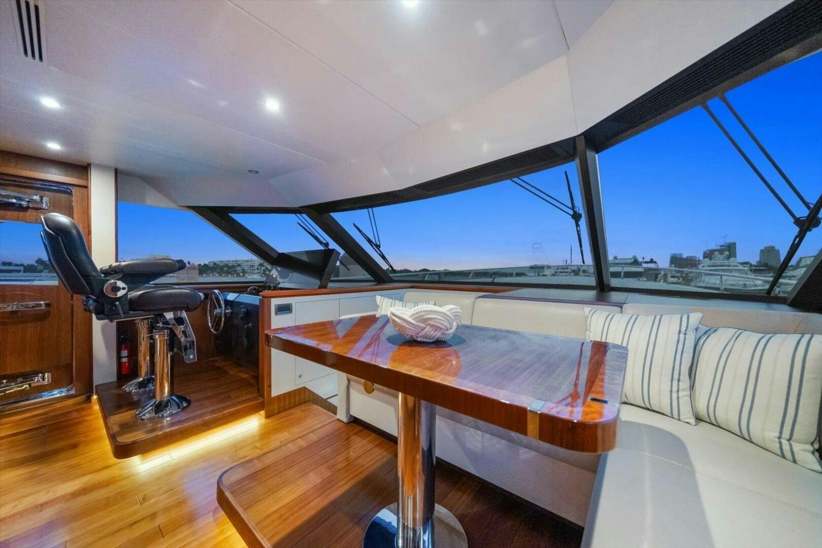 a room with a bed and a chair aboard CAROL ELAINE Yacht for Sale