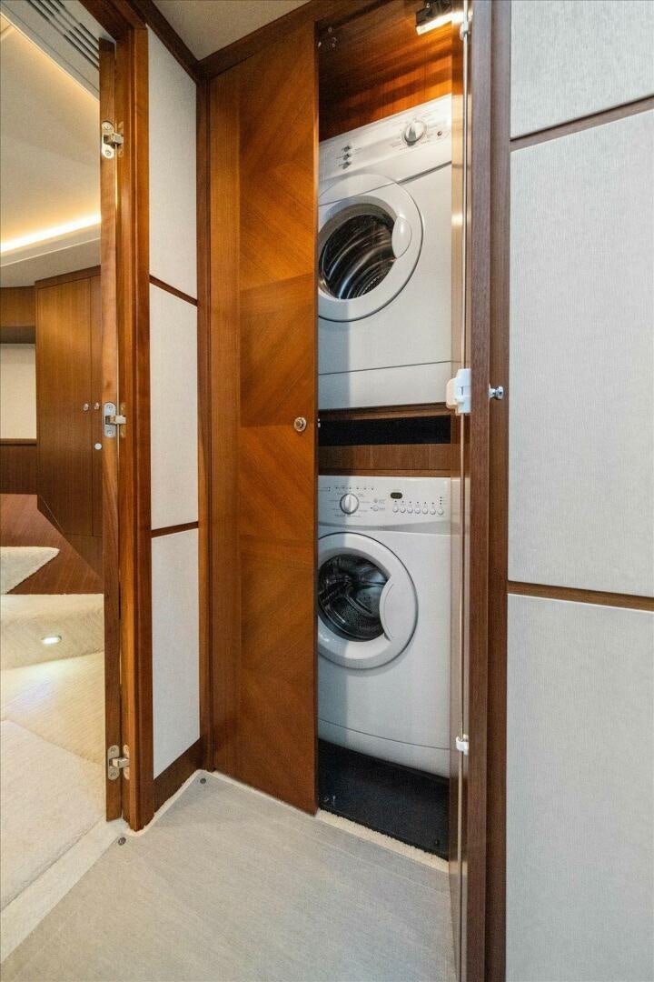 a washer and dryer in a room aboard CAROL ELAINE Yacht for Sale