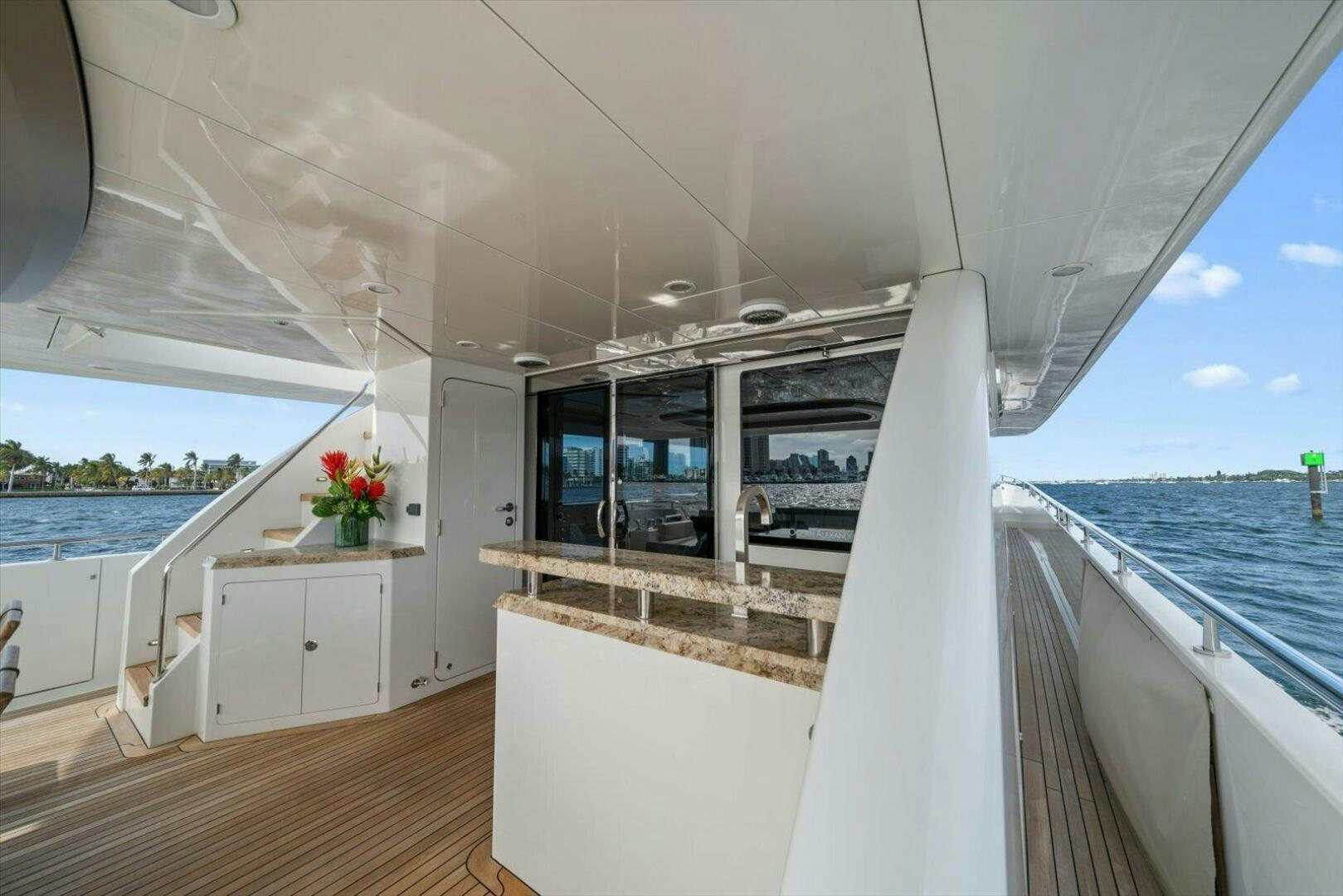a large white boat with a balcony aboard CAROL ELAINE Yacht for Sale