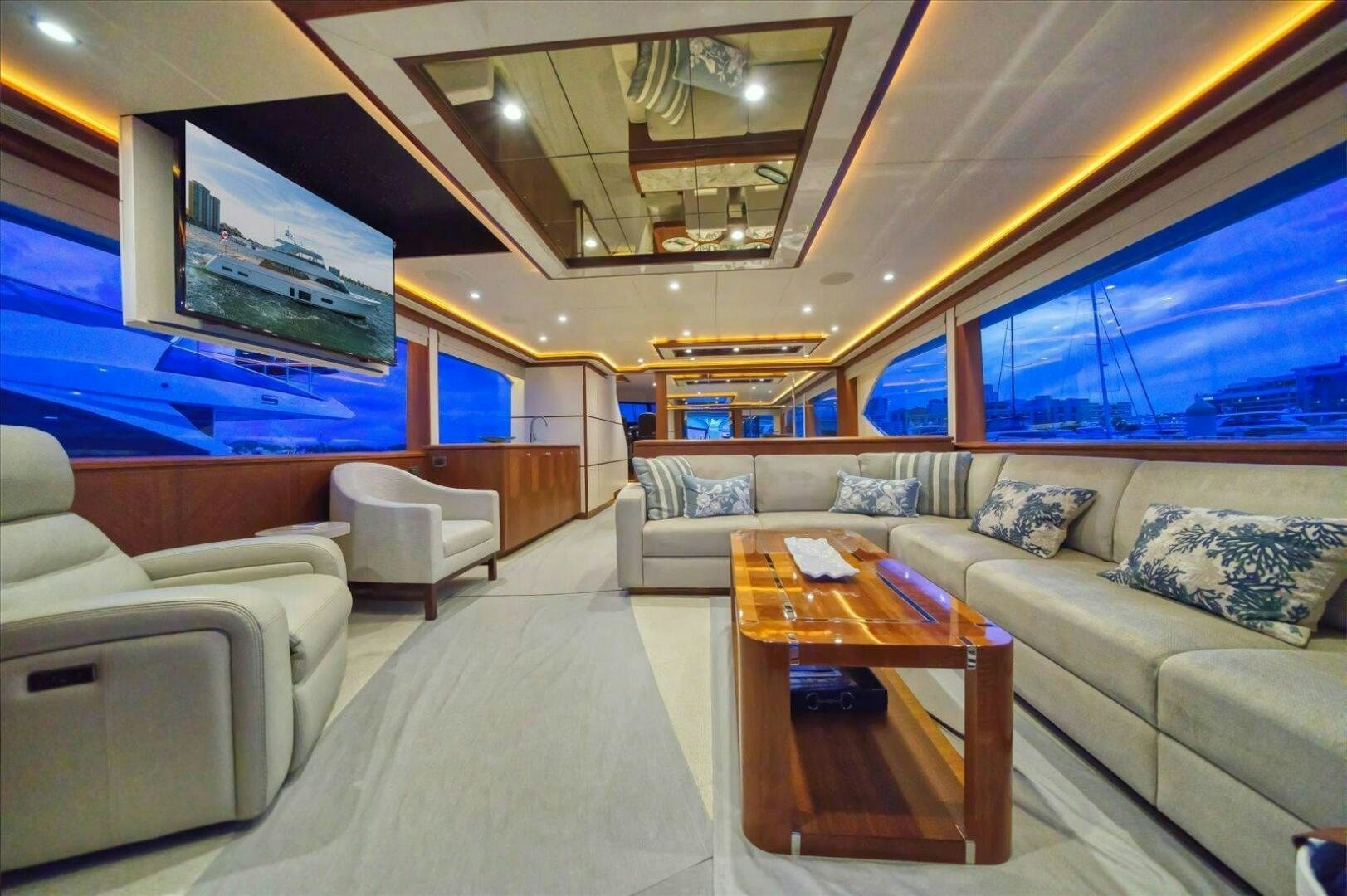 a living room with a couch and a table aboard CAROL ELAINE Yacht for Sale