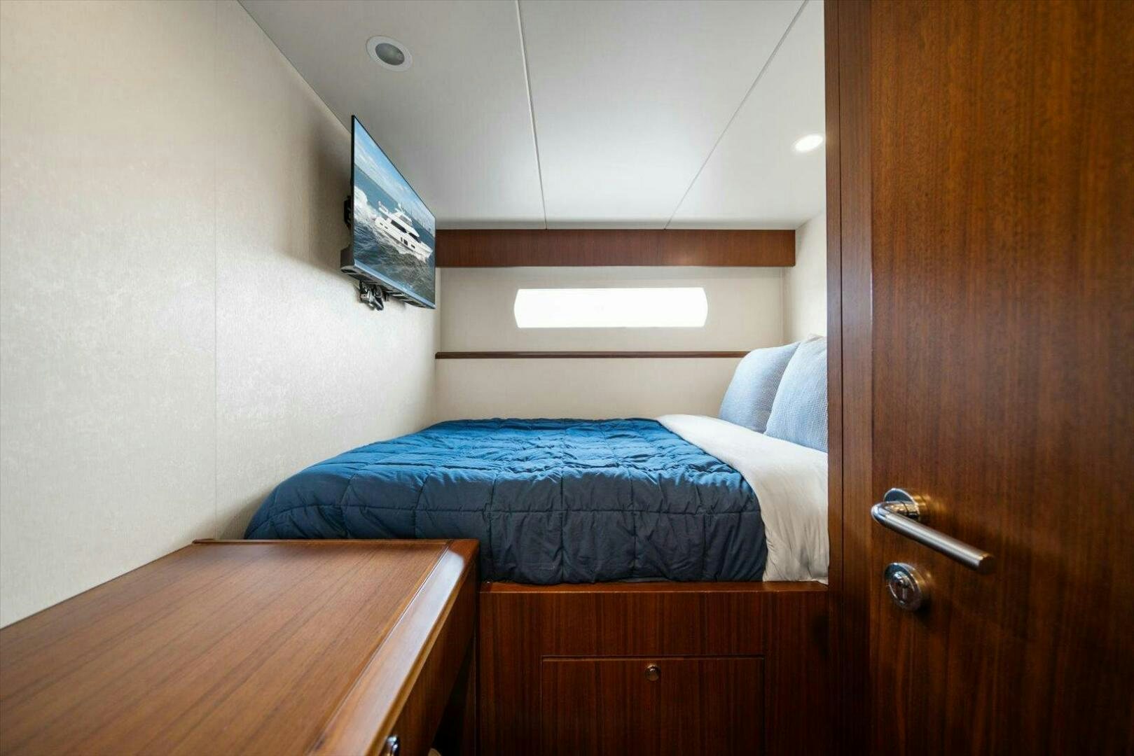 a bed in a room aboard CAROL ELAINE Yacht for Sale