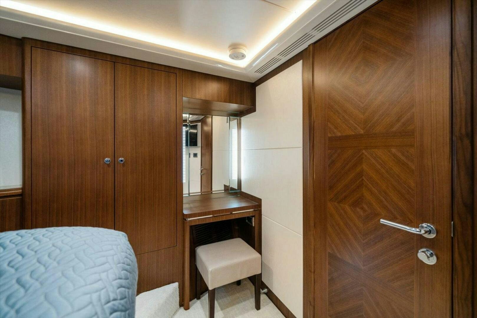 a room with wooden cabinets aboard CAROL ELAINE Yacht for Sale