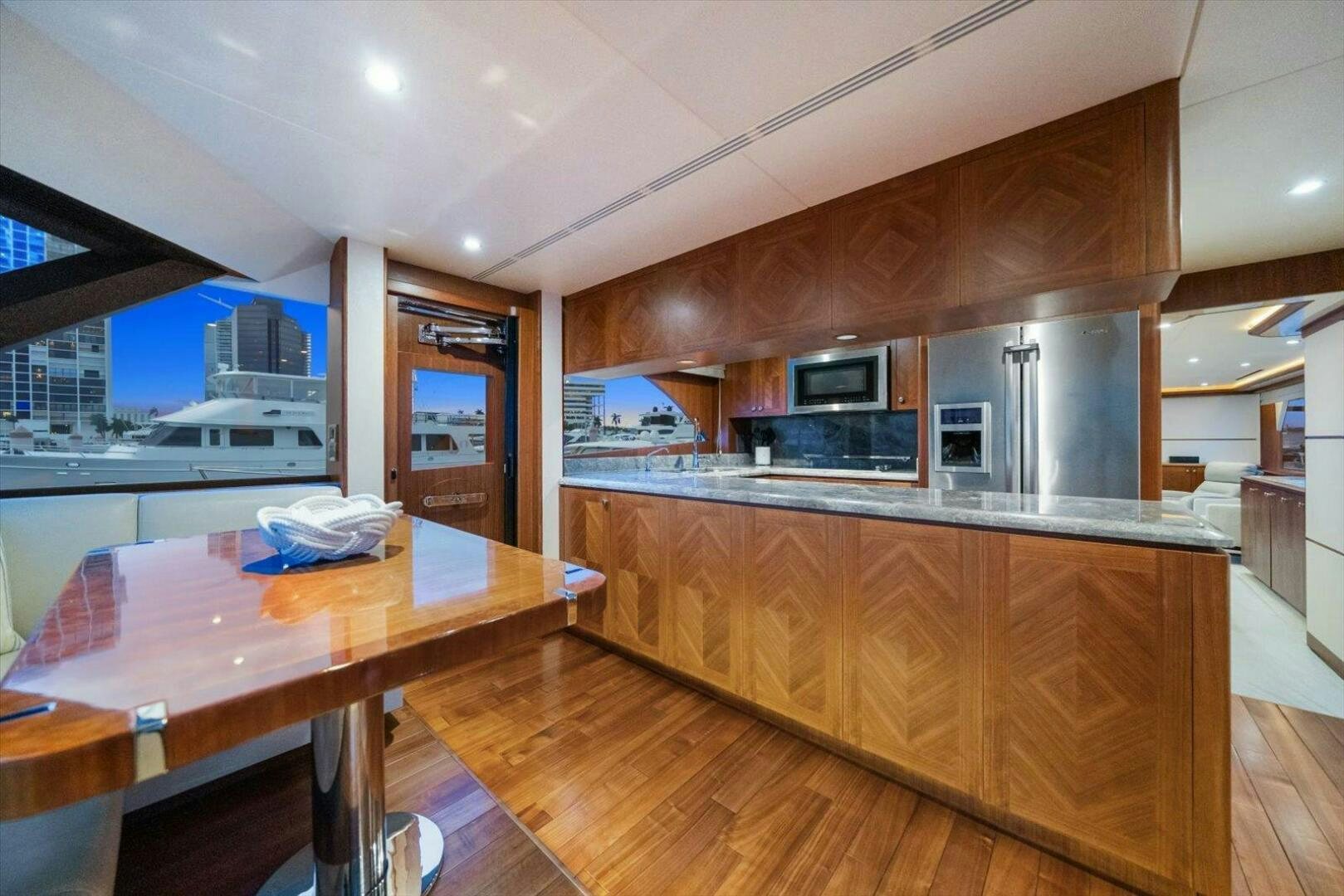 a kitchen with a large island aboard CAROL ELAINE Yacht for Sale