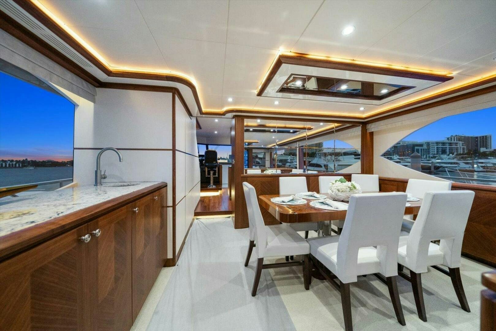 a kitchen and dining area aboard CAROL ELAINE Yacht for Sale