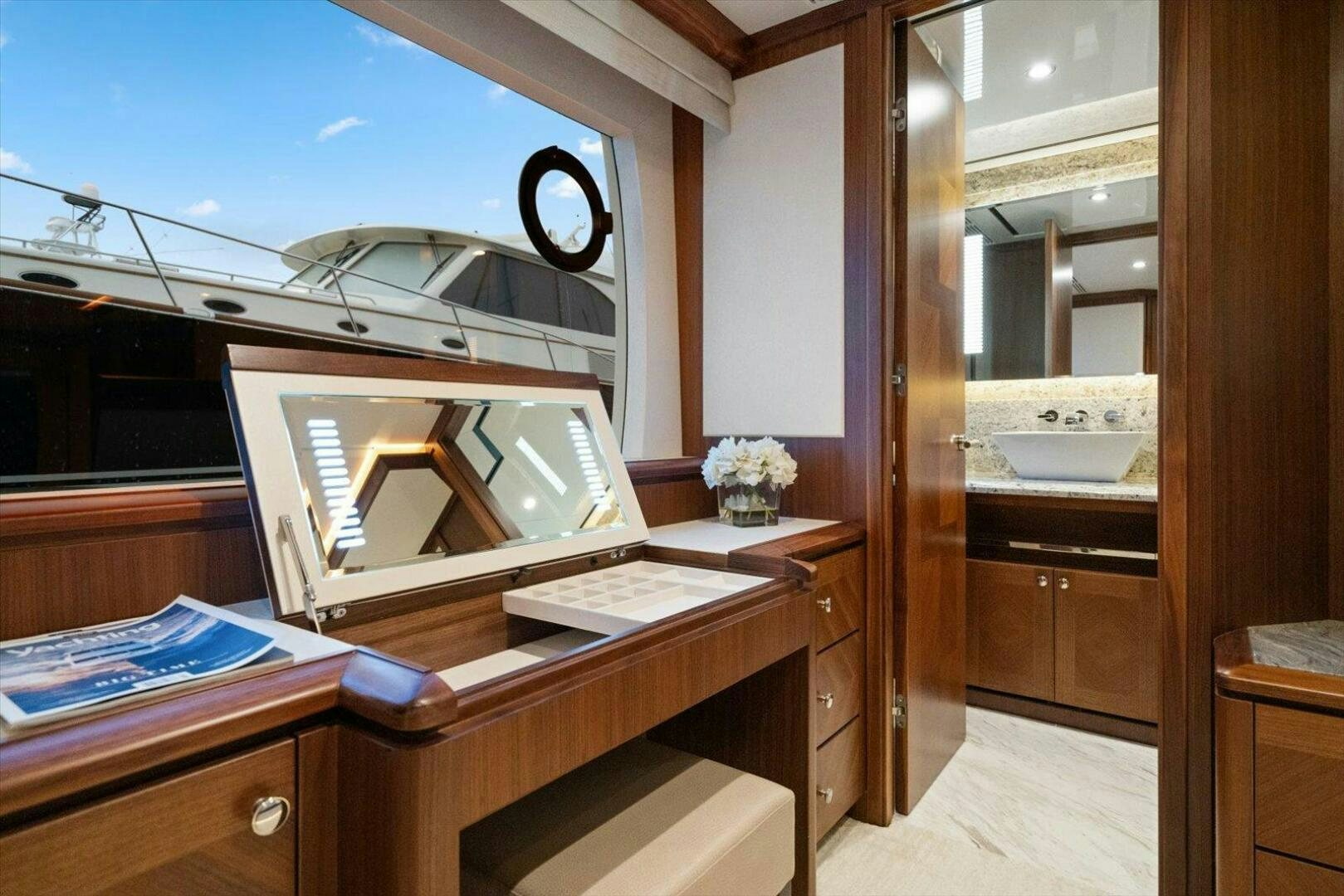 a room with a desk and a bed aboard CAROL ELAINE Yacht for Sale