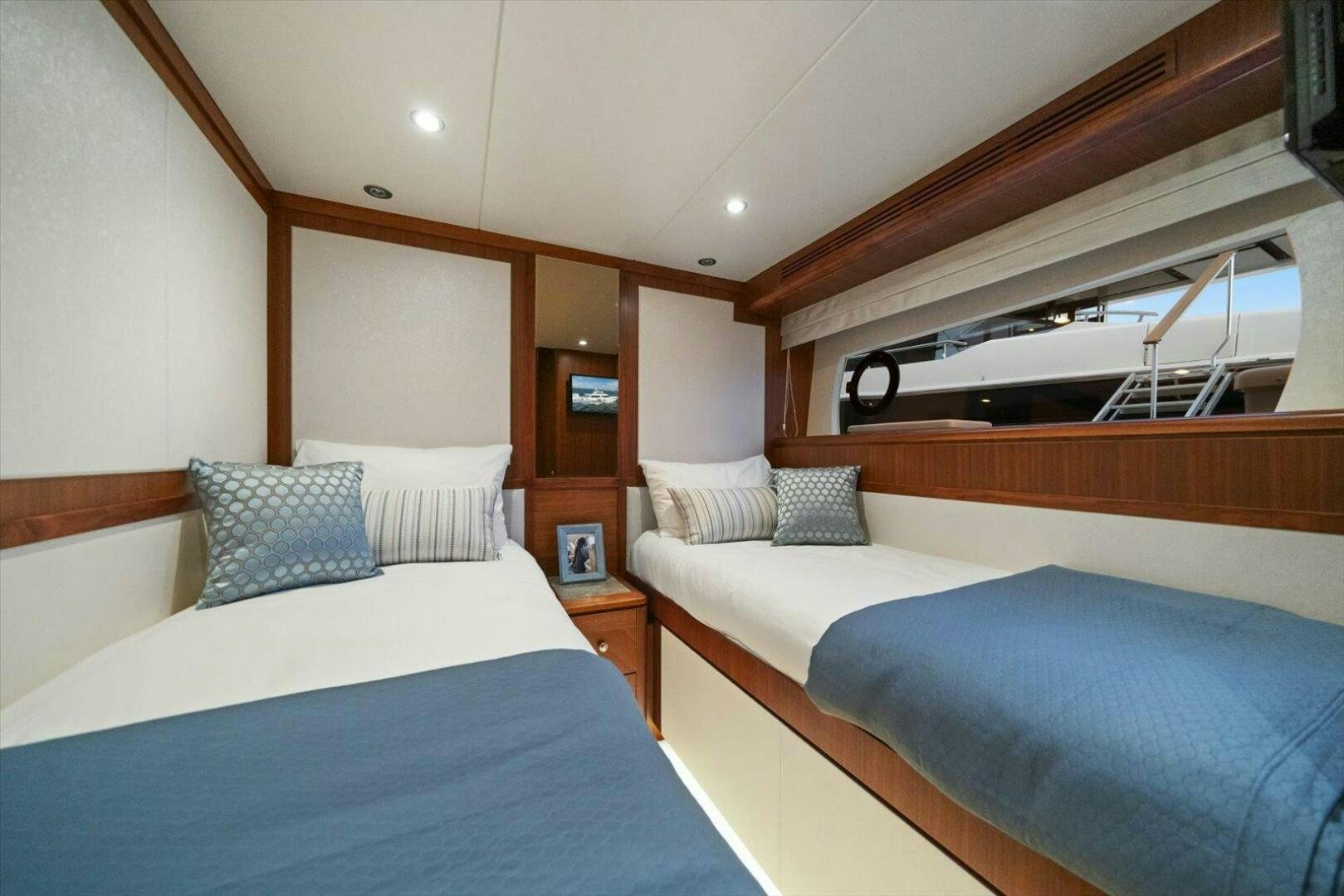 a room with two beds aboard CAROL ELAINE Yacht for Sale
