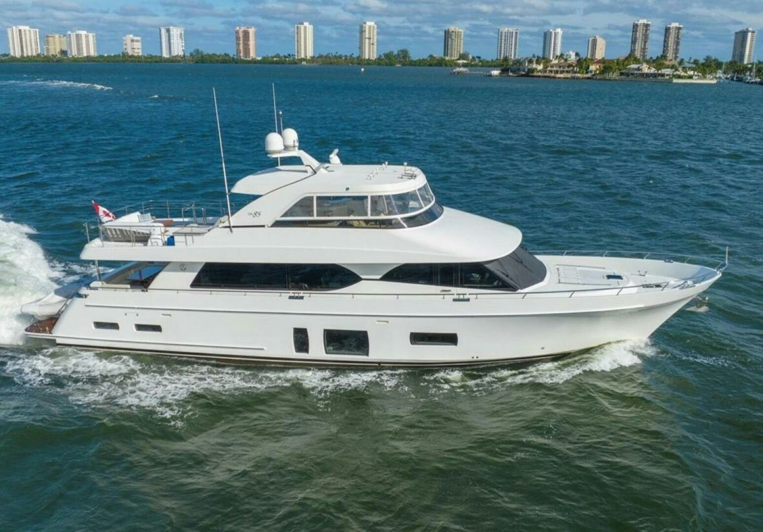 a white yacht in the water aboard CAROL ELAINE Yacht for Sale