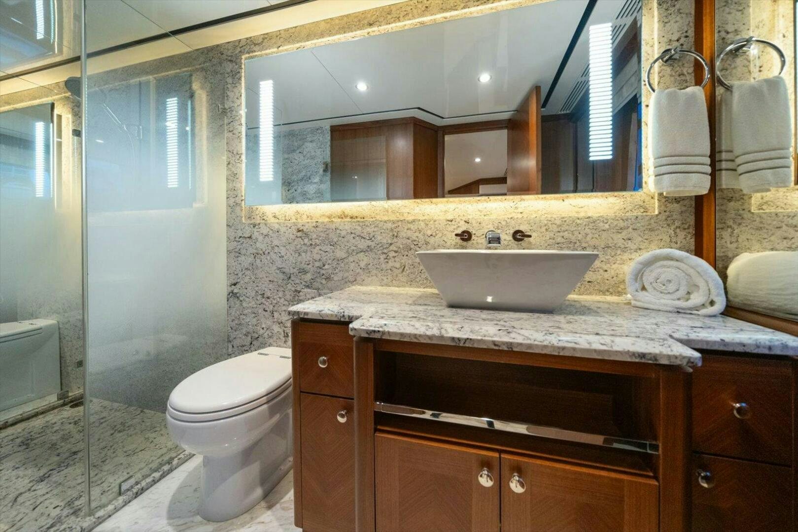 a bathroom with a sink and a toilet aboard CAROL ELAINE Yacht for Sale