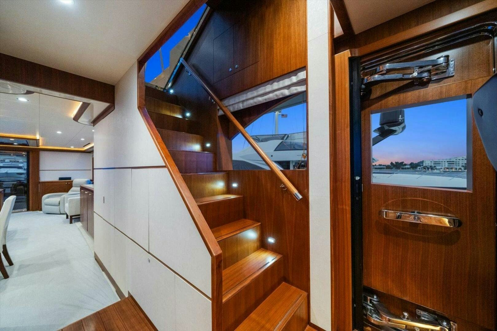 a room with a wood cabinet and a wood door aboard CAROL ELAINE Yacht for Sale