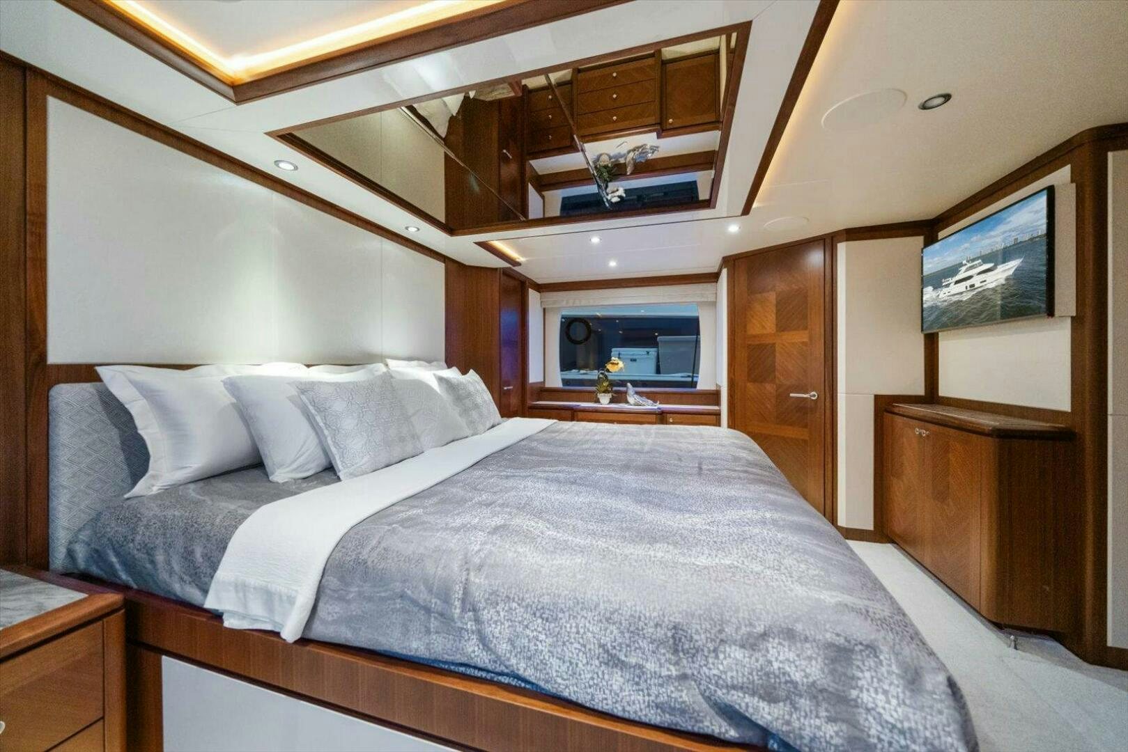 a bed with white sheets aboard CAROL ELAINE Yacht for Sale