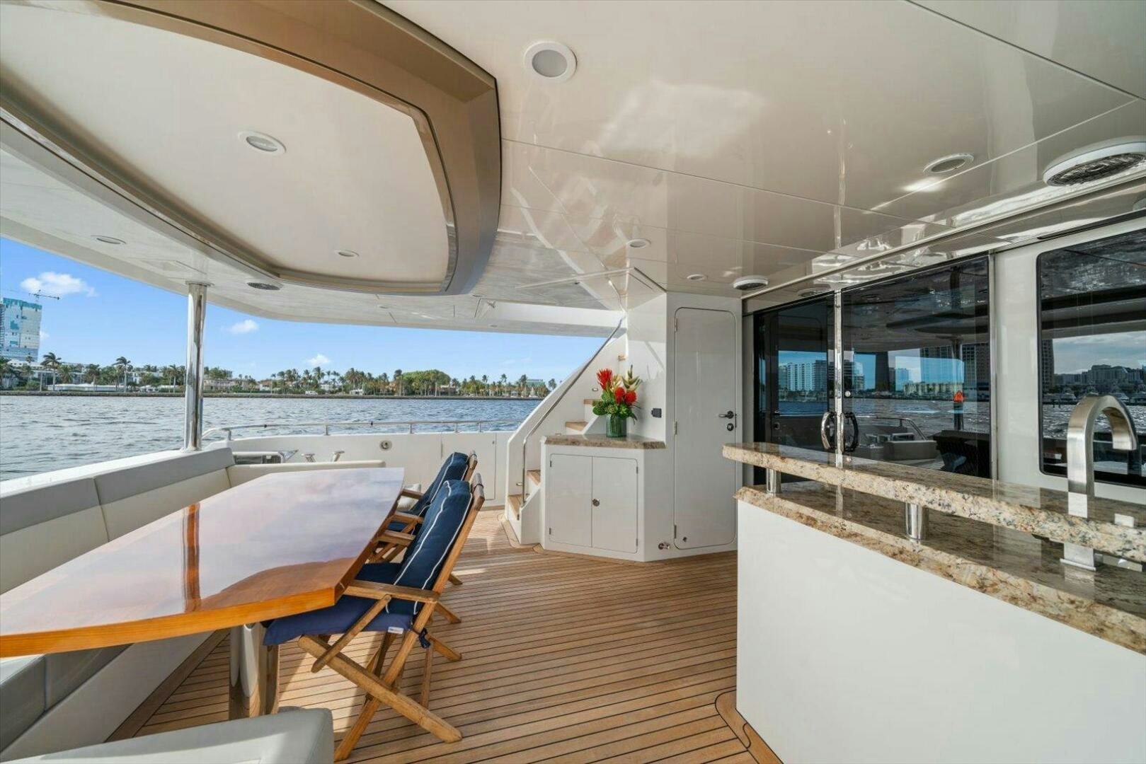 a boat with a wood deck aboard CAROL ELAINE Yacht for Sale