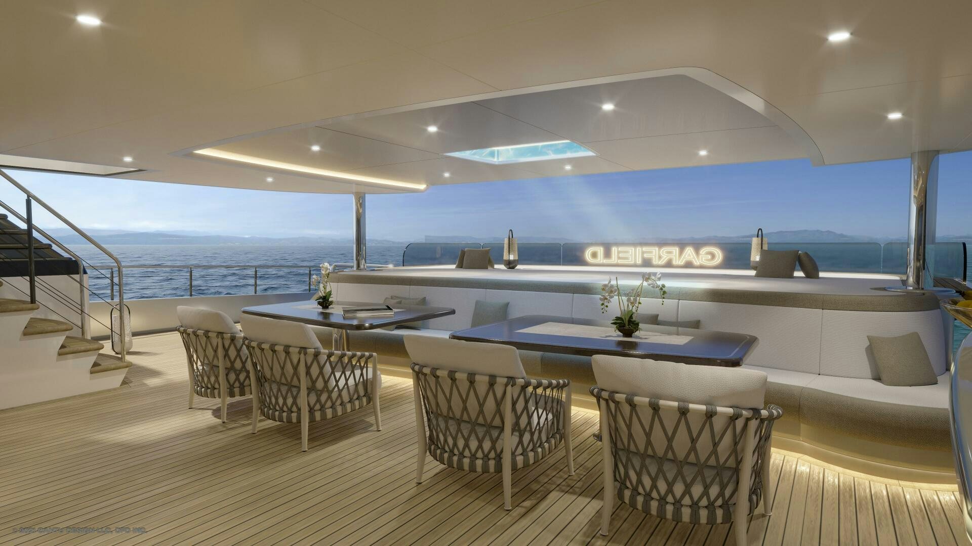 a large room with a table and chairs and a large pool aboard BBC130 PROJECT GARFIELD Yacht for Sale