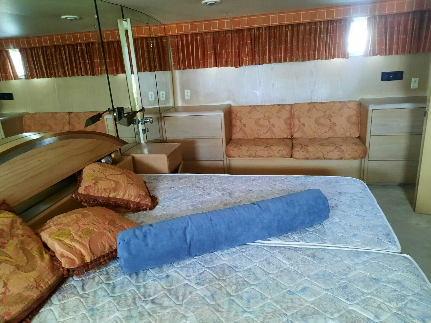 a room with a bed and a sink aboard URBAN LEGEND Yacht for Sale