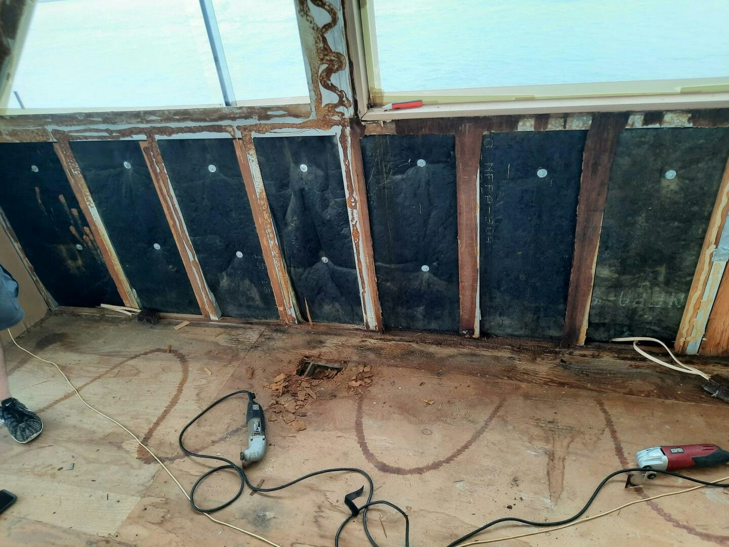a room with a window and wires aboard URBAN LEGEND Yacht for Sale