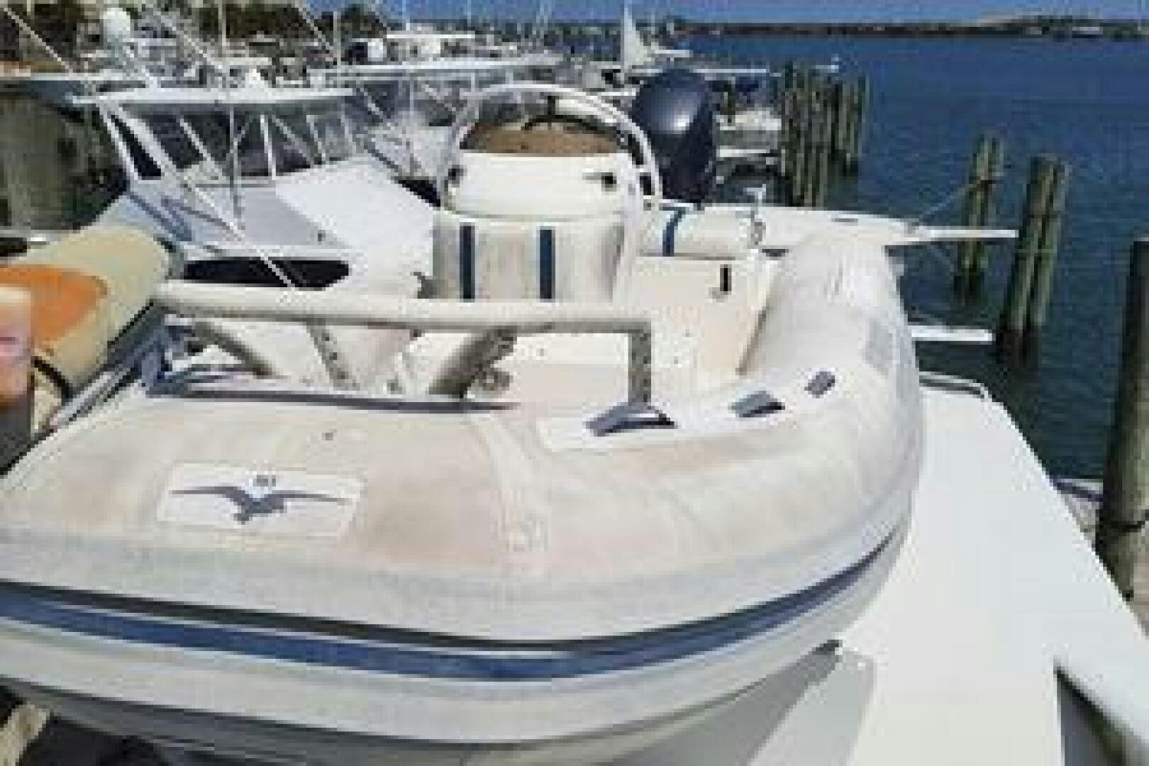 a white yacht on a white surface aboard URBAN LEGEND Yacht for Sale