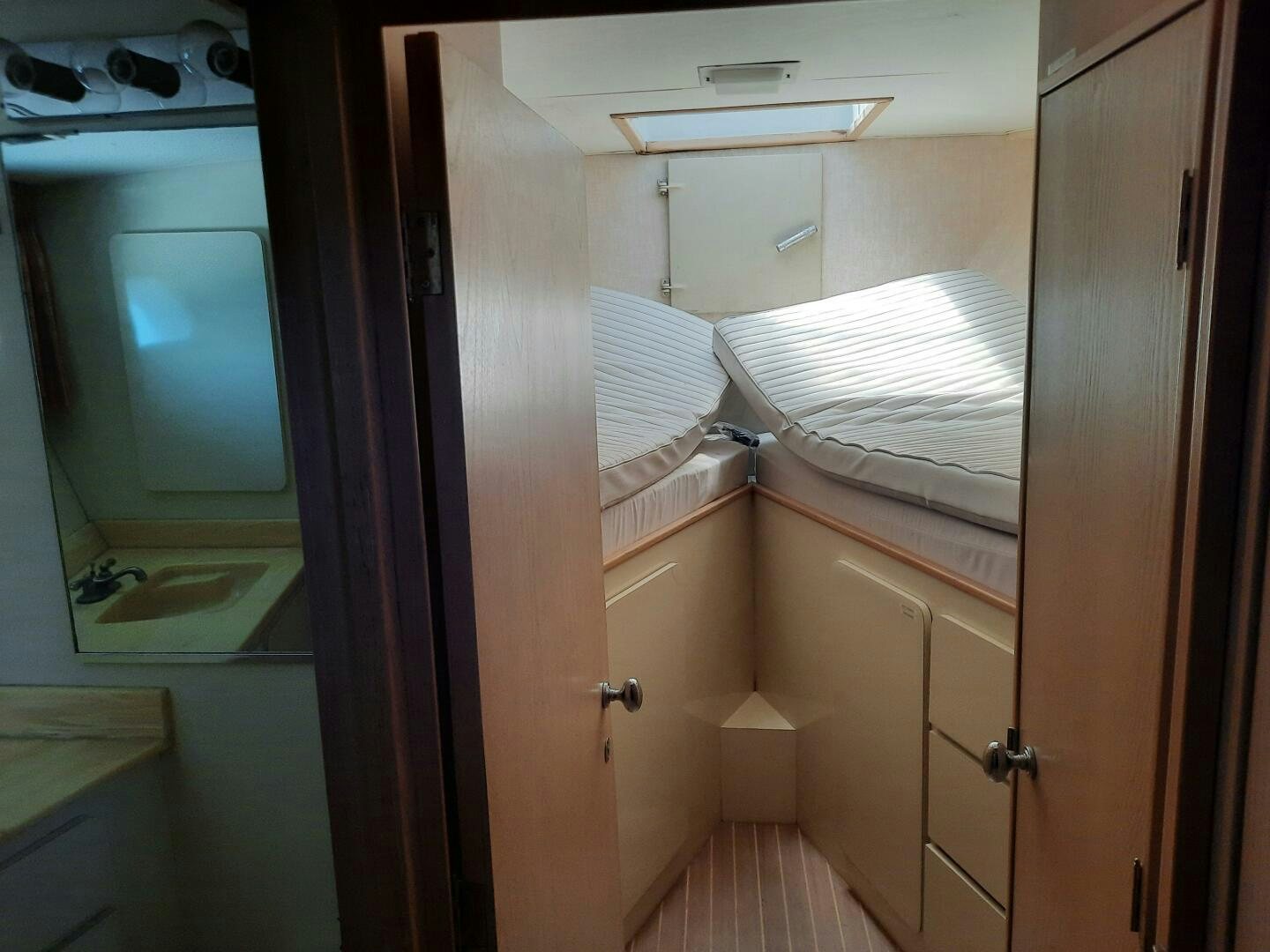 a bathroom with a shower and sink aboard URBAN LEGEND Yacht for Sale