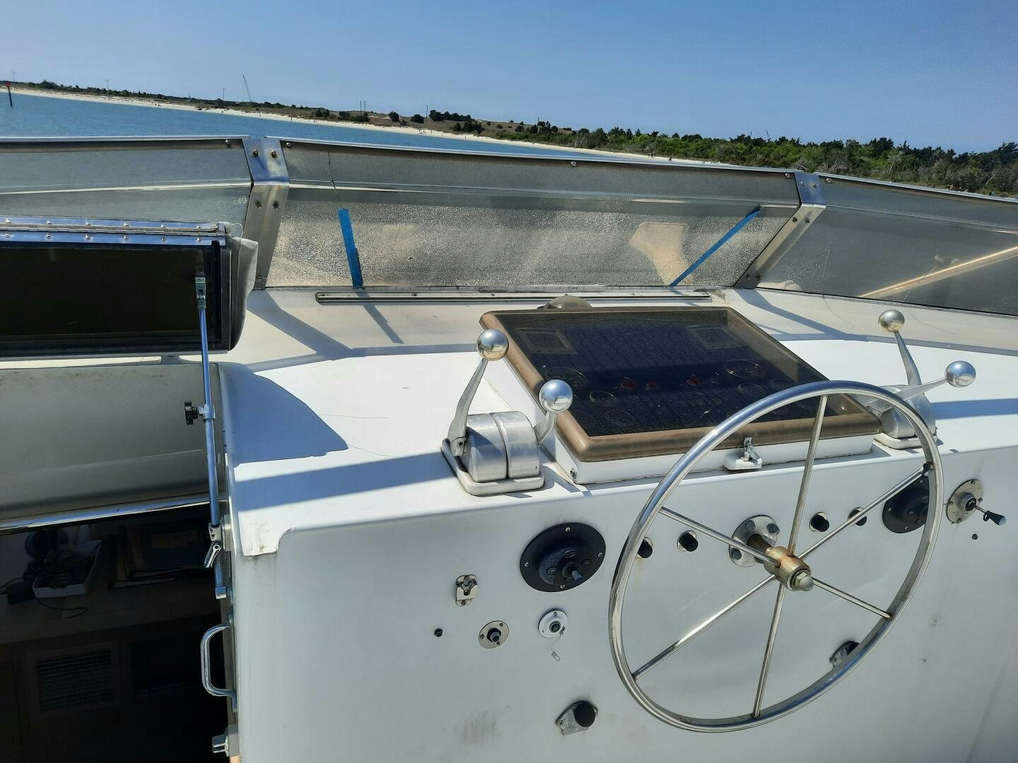 a white boat with a metal frame aboard URBAN LEGEND Yacht for Sale