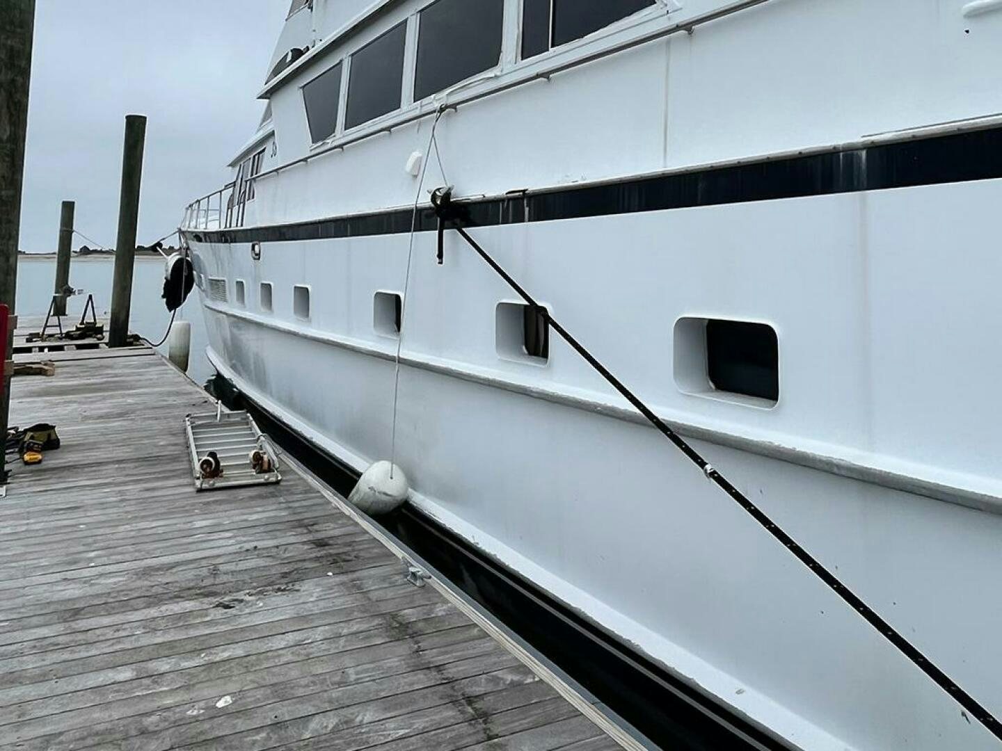 a boat on a dock aboard URBAN LEGEND Yacht for Sale