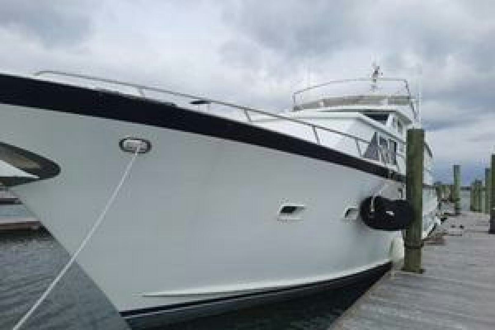 a large white boat aboard URBAN LEGEND Yacht for Sale