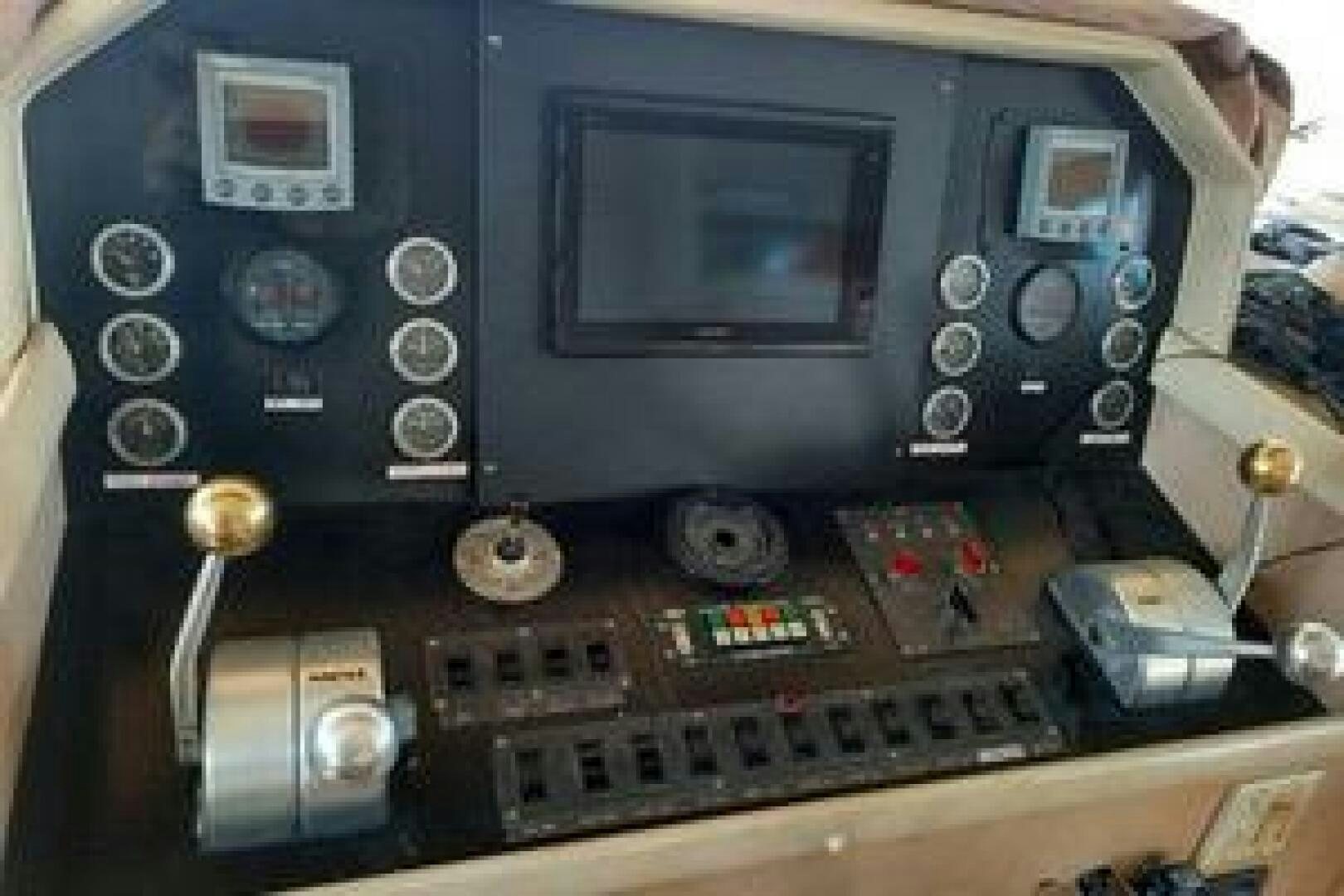 a close-up of a console aboard URBAN LEGEND Yacht for Sale