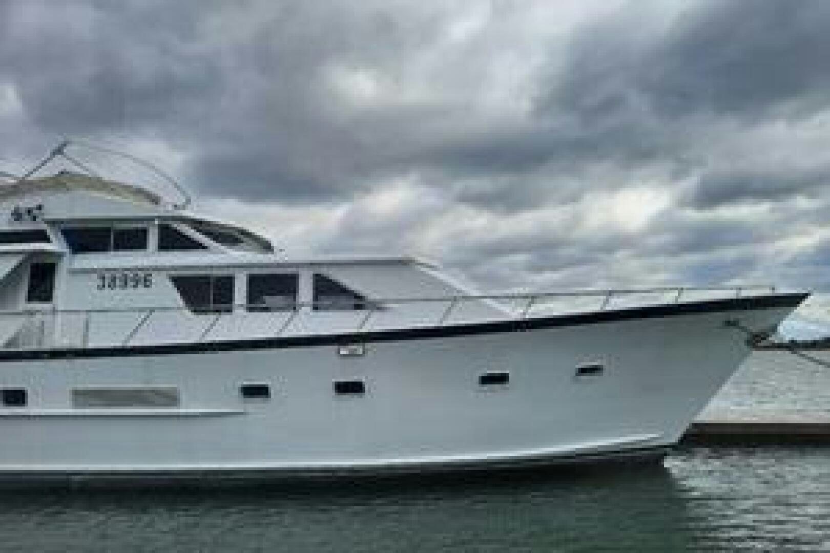 a large white yacht aboard URBAN LEGEND Yacht for Sale