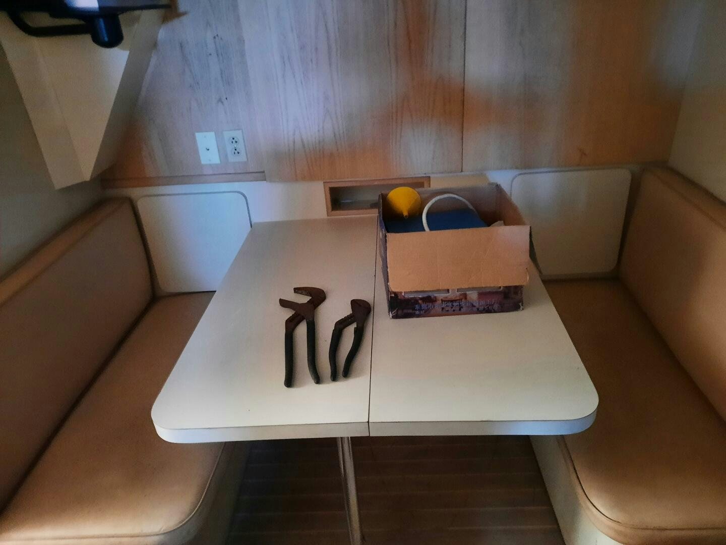 a table with a pair of scissors on it aboard URBAN LEGEND Yacht for Sale