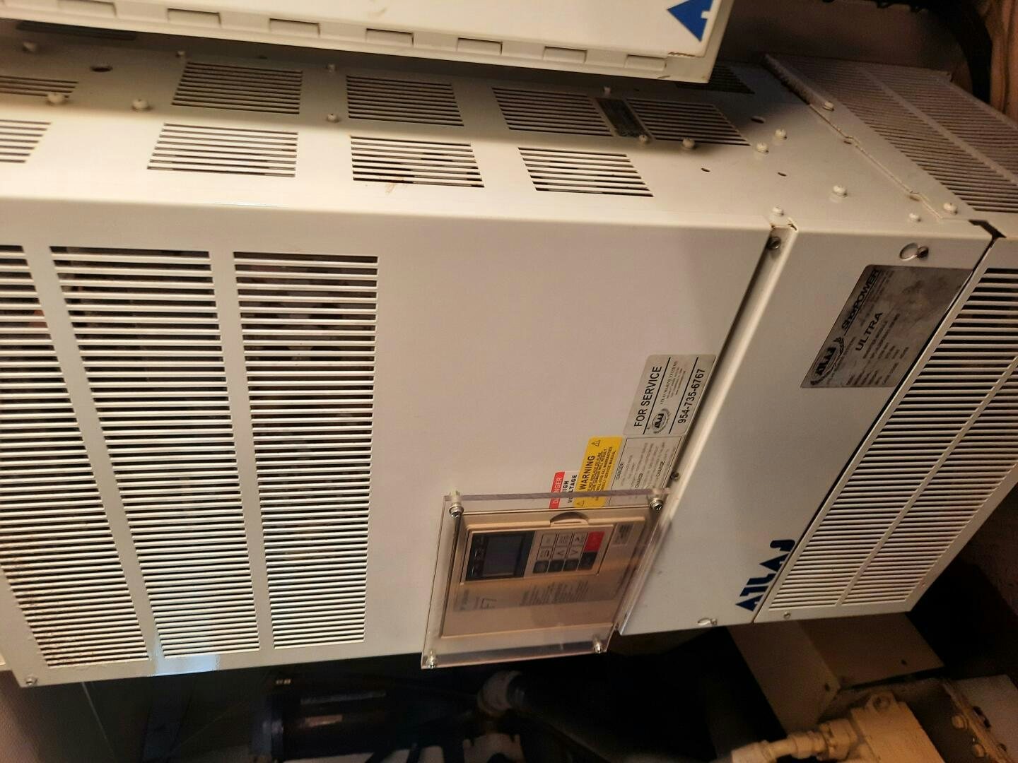 a white box with a window aboard URBAN LEGEND Yacht for Sale