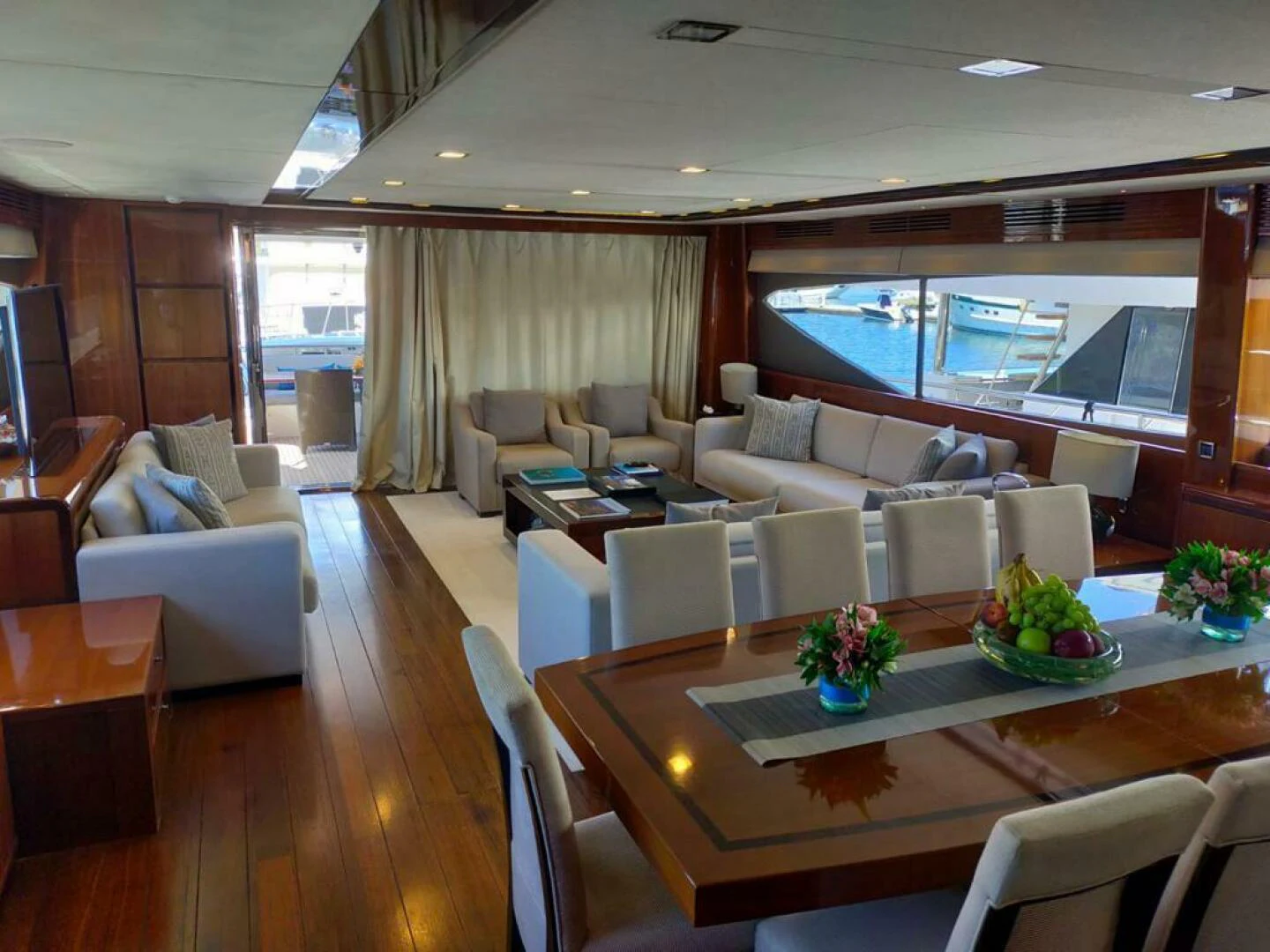 a living room with a table and chairs aboard PRINCESS TWO Yacht for Sale