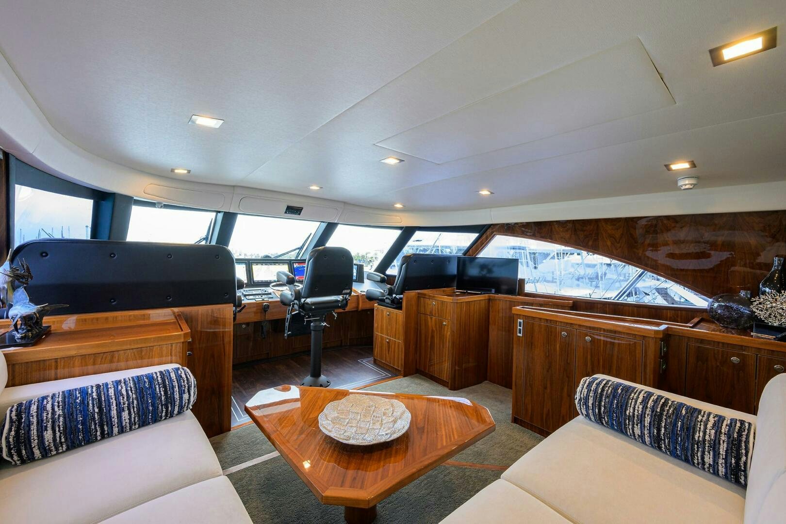 a room with a couch and a table and a television aboard FOR PETE'S SAKE Yacht for Sale