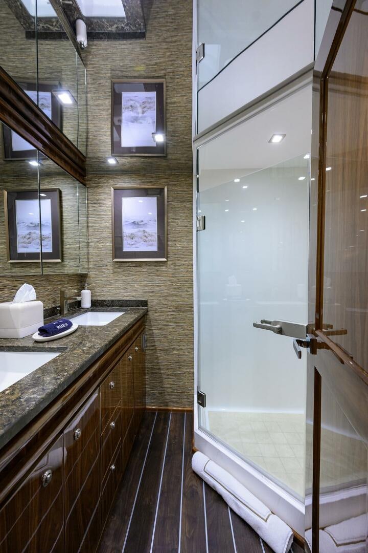 a bathroom with a shower and sink aboard FOR PETE'S SAKE Yacht for Sale