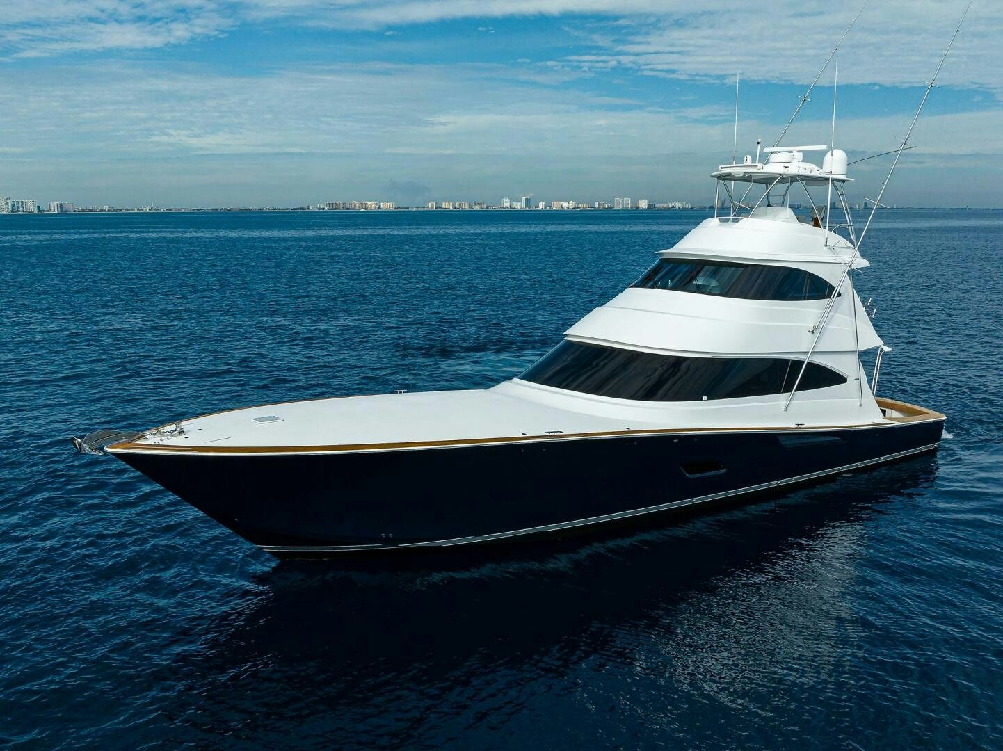 a white yacht in the water aboard FOR PETE'S SAKE Yacht for Sale