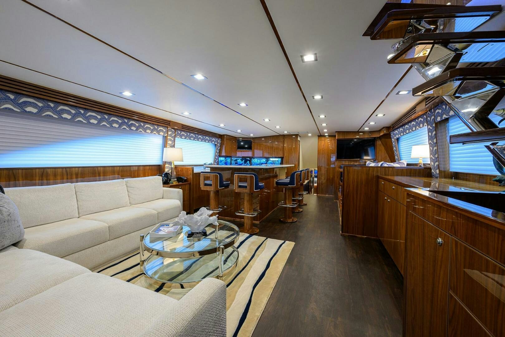 a large room with a couch and a table aboard FOR PETE'S SAKE Yacht for Sale