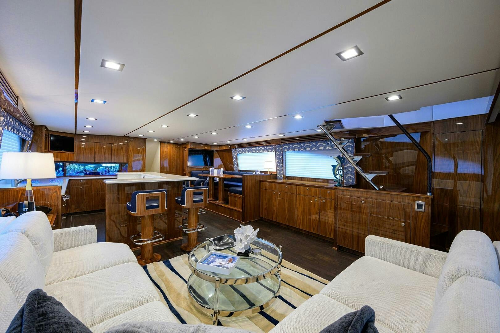 a living room with a large window aboard FOR PETE'S SAKE Yacht for Sale