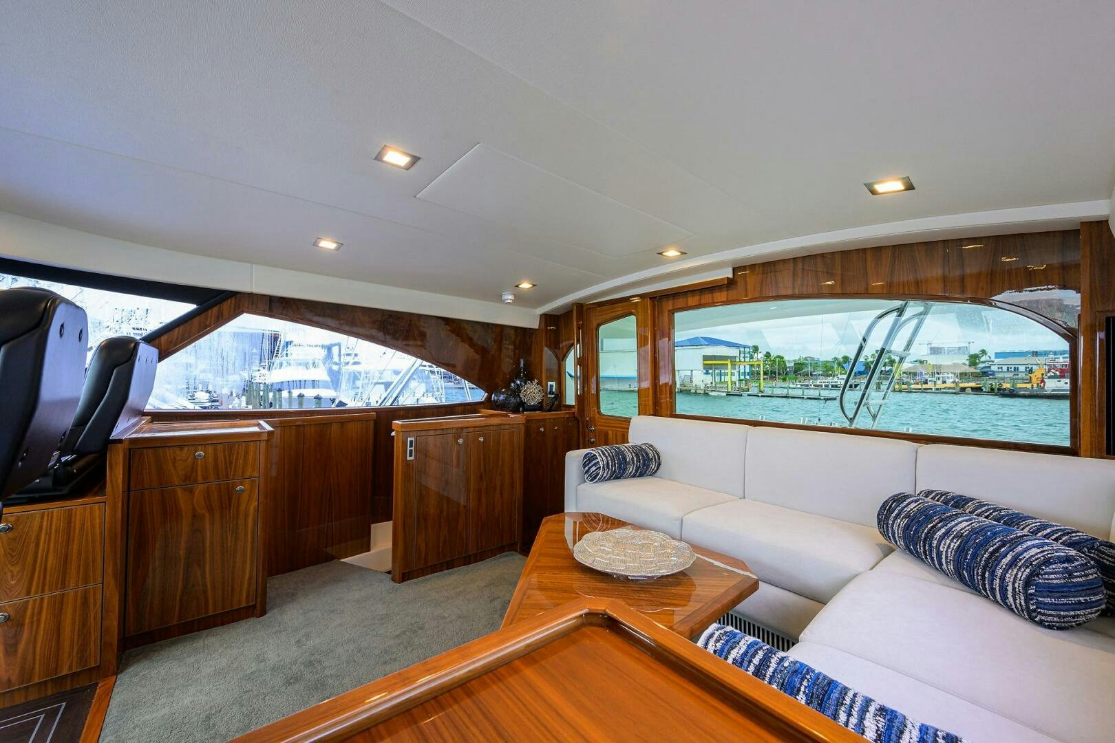 a living room with a large window aboard FOR PETE'S SAKE Yacht for Sale