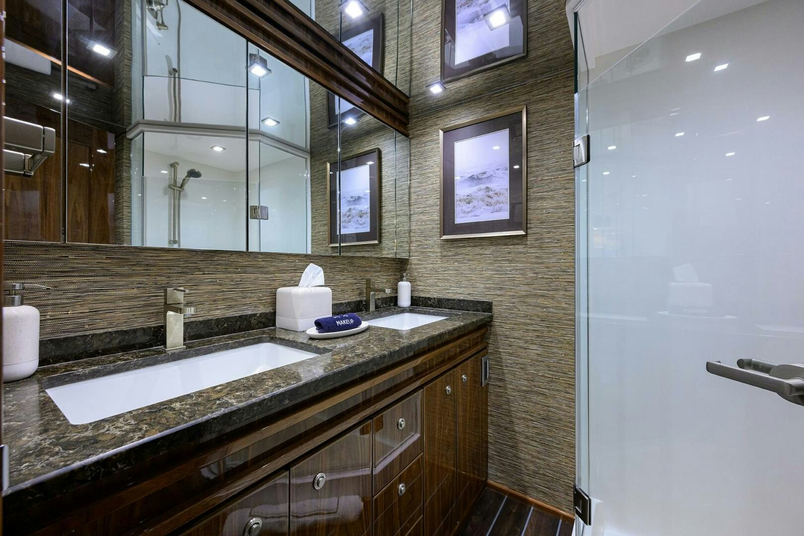 a bathroom with a large mirror aboard FOR PETE'S SAKE Yacht for Sale