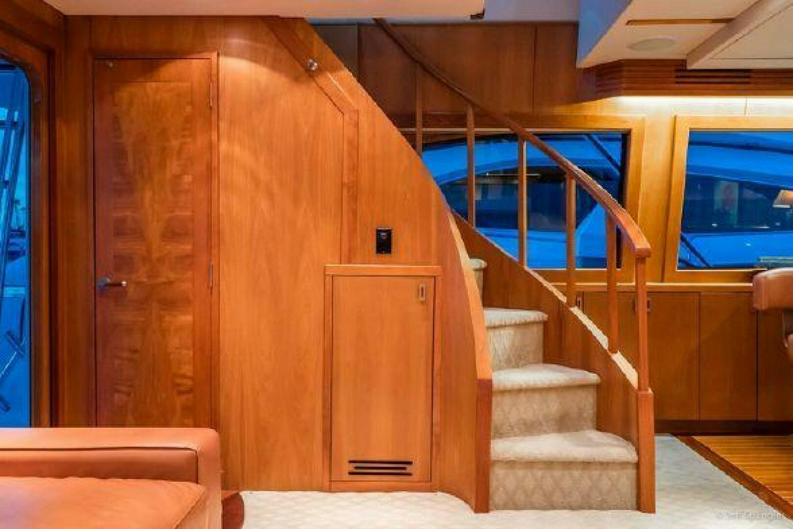 a wooden door and a bench aboard DESPERADO Yacht for Sale