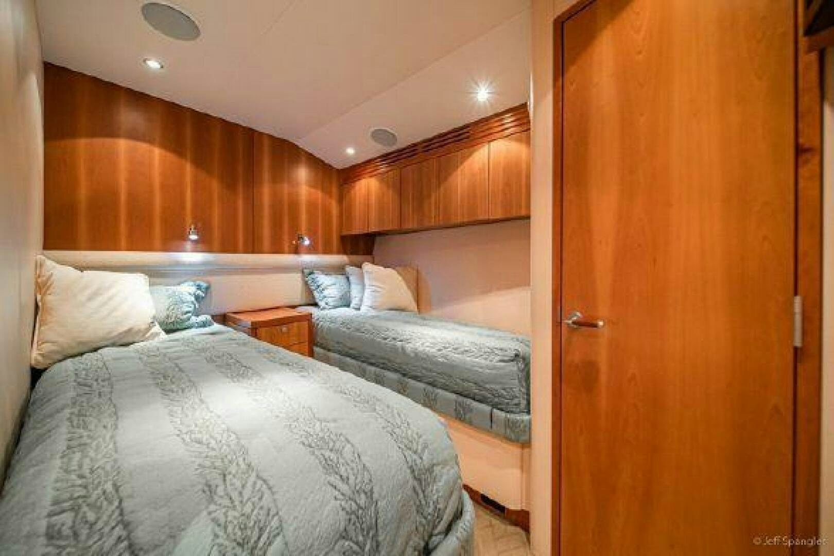 a couple of beds in a room aboard DESPERADO Yacht for Sale