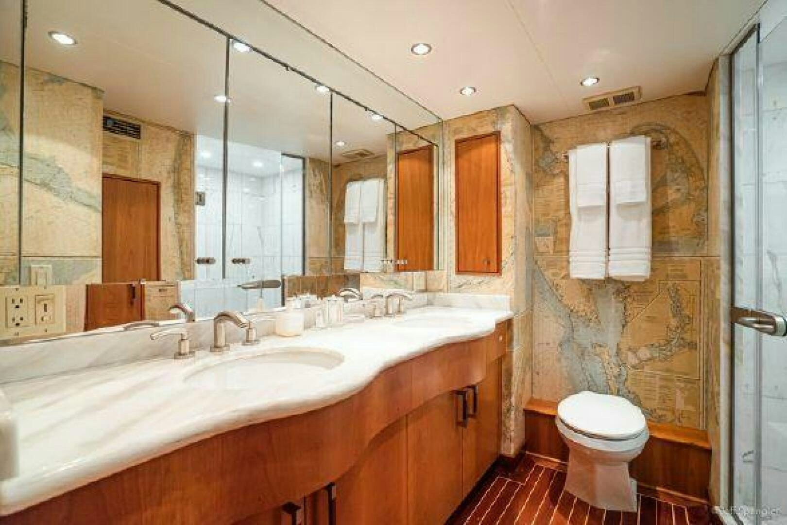 a bathroom with a sink and a toilet aboard DESPERADO Yacht for Sale