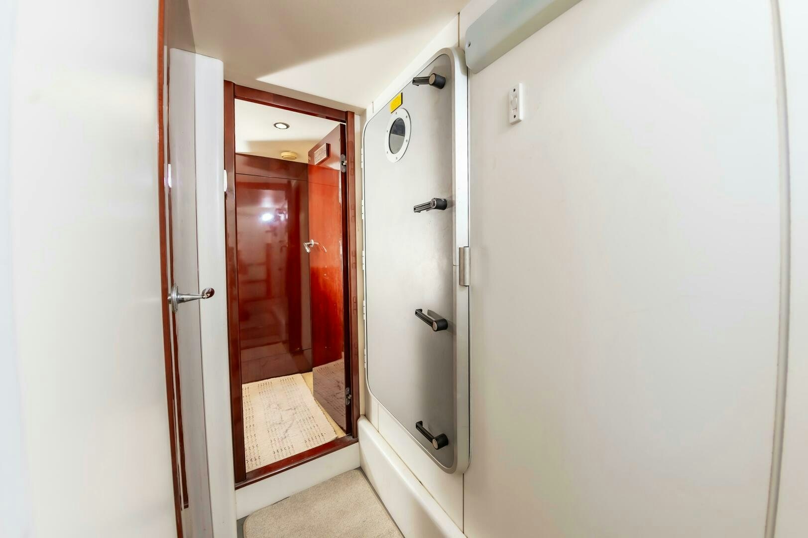 a hallway with doors aboard ANDREA'S REVENGE Yacht for Sale