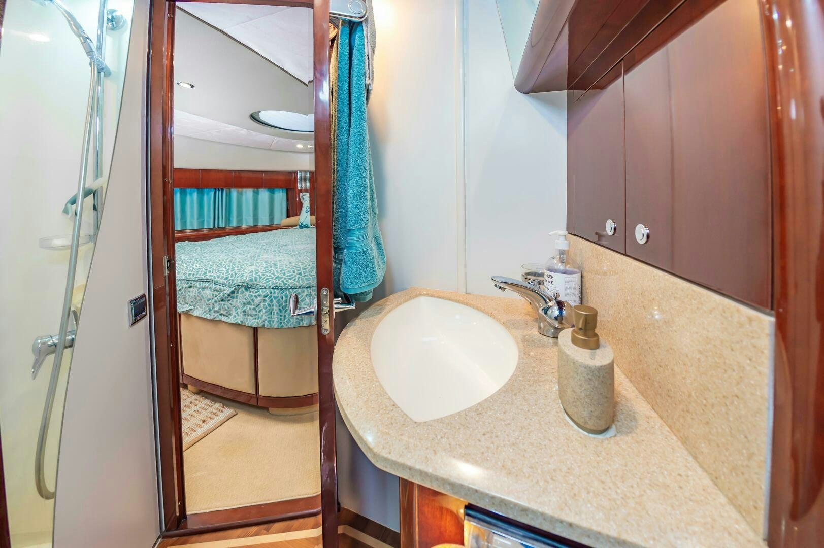 a bathroom with a sink and a mirror aboard ANDREA'S REVENGE Yacht for Sale