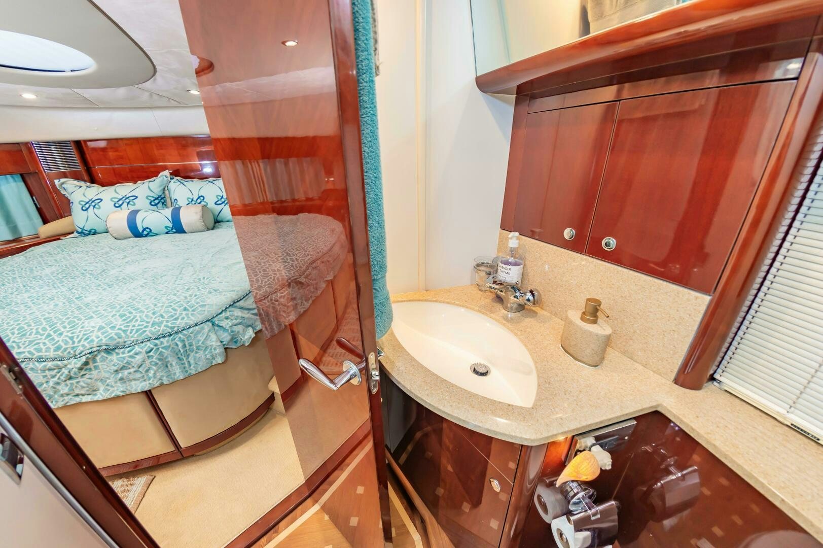 a bathroom with a sink and a mirror aboard ANDREA'S REVENGE Yacht for Sale