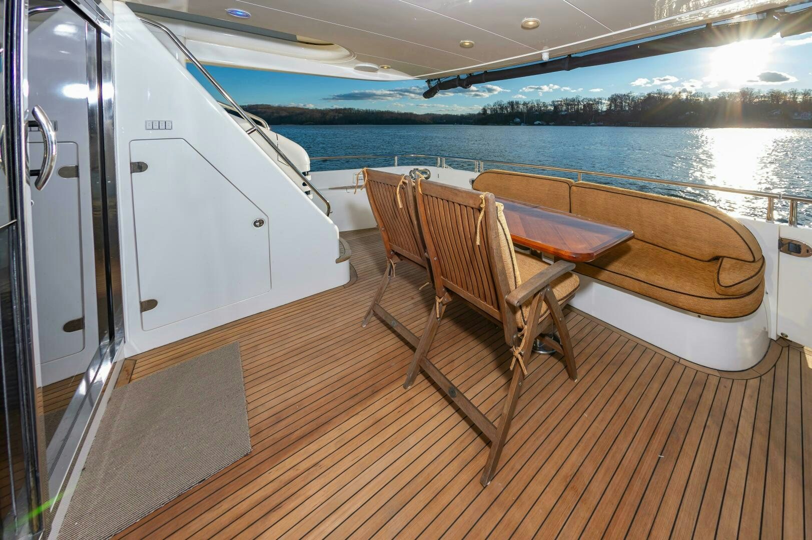 a table and chairs on a boat aboard ANDREA'S REVENGE Yacht for Sale