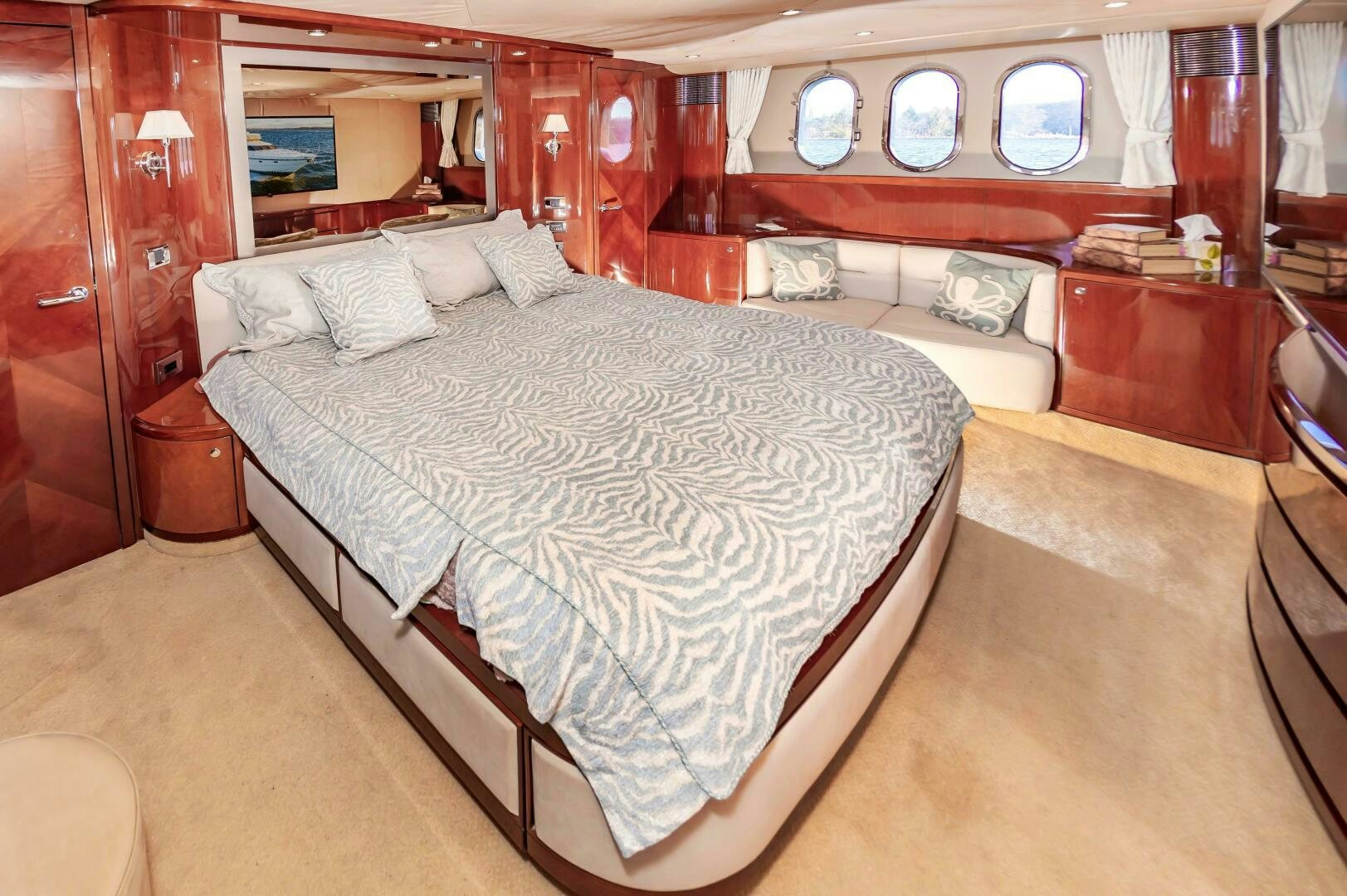 a room with a bed and a mirror aboard ANDREA'S REVENGE Yacht for Sale