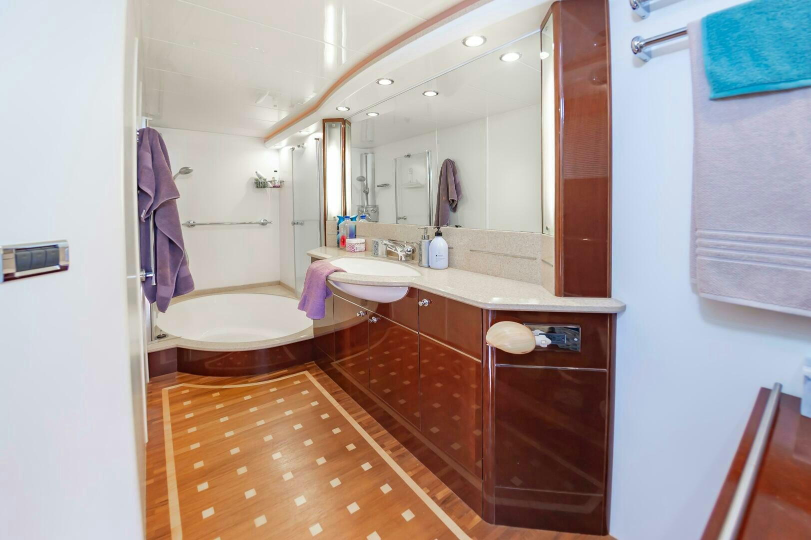 a bathroom with a sink and a mirror aboard ANDREA'S REVENGE Yacht for Sale