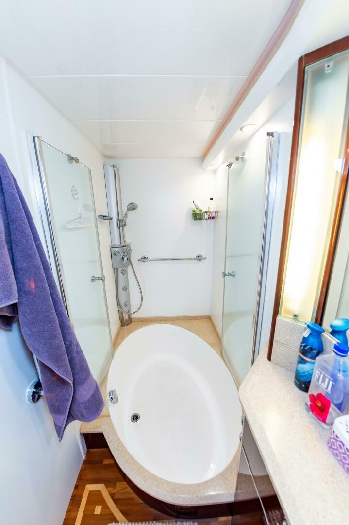 a bathroom with a towel over the toilet aboard ANDREA'S REVENGE Yacht for Sale