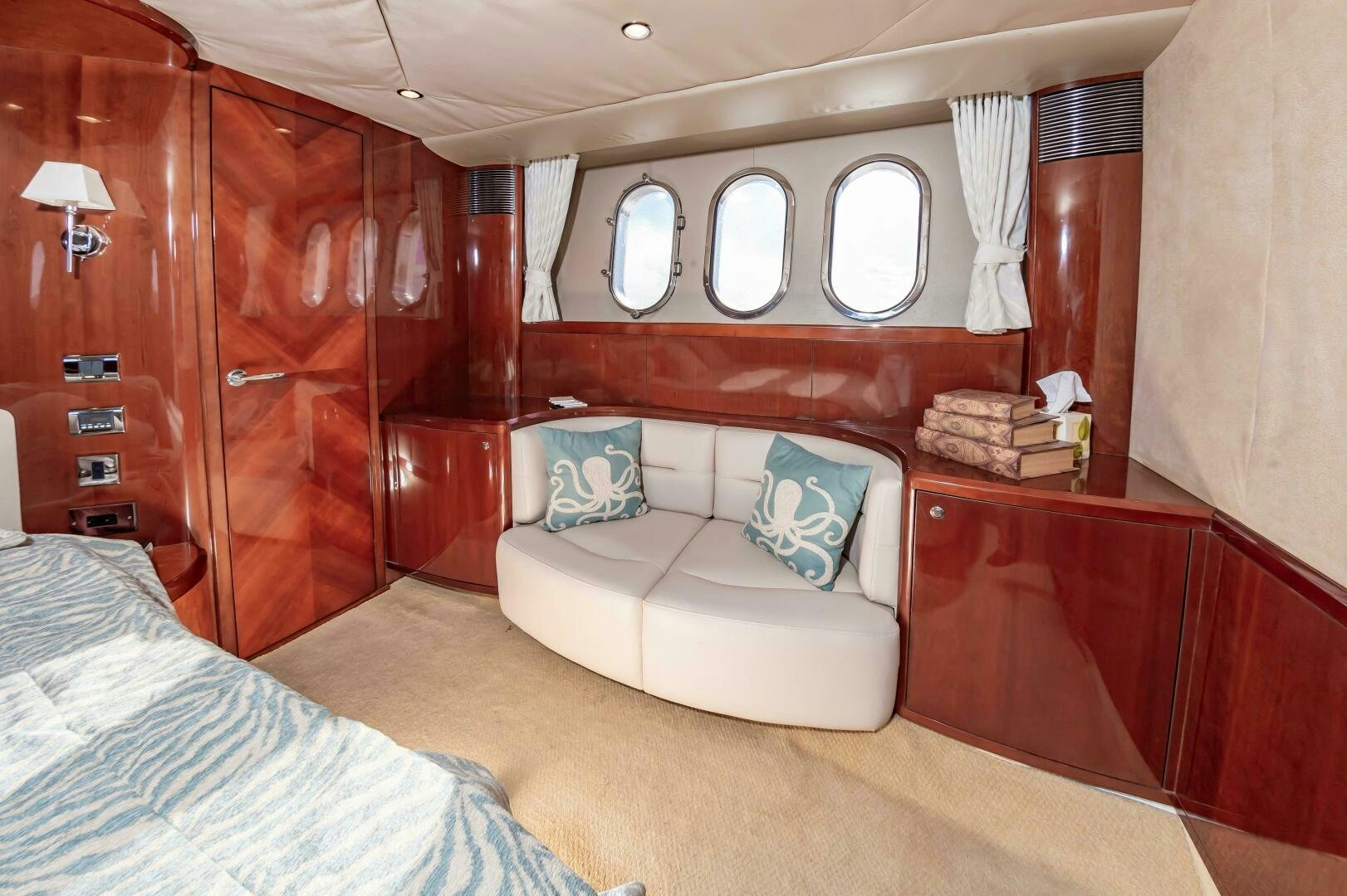 a room with a bed and a couch aboard ANDREA'S REVENGE Yacht for Sale