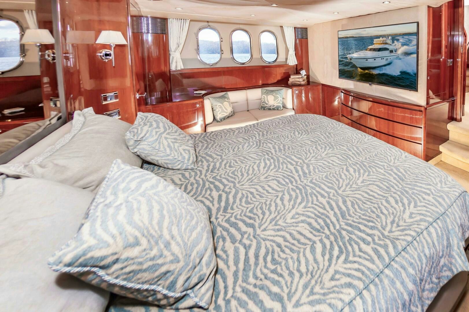 a bed with white sheets aboard ANDREA'S REVENGE Yacht for Sale